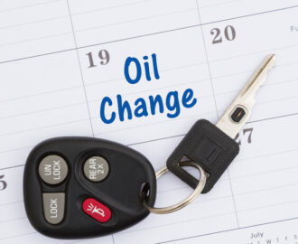 note on a calendar to get an oil change with car keys on calendar Legacy Auto Clinic Castle Rock