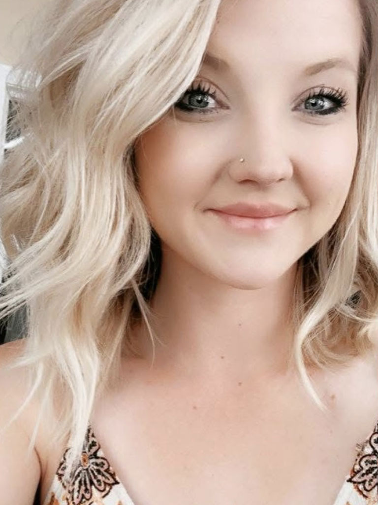 co-owner of Legacy Auto Clinic Castle Rock poses for a photo