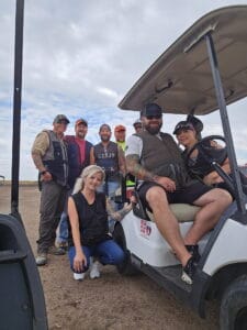staff with Legacy Auto Clinic Castle Rock pose for a photo during a charity event