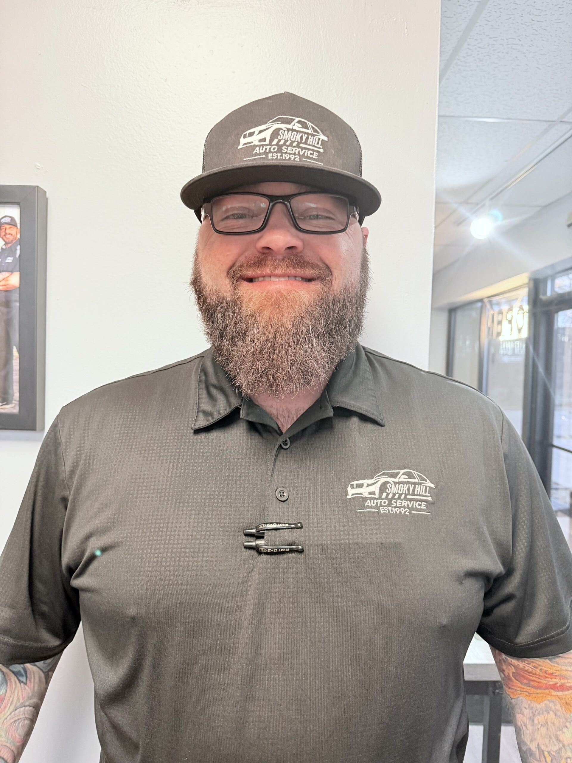 co-owner of Legacy Auto Clinic Castle Rock poses for photo