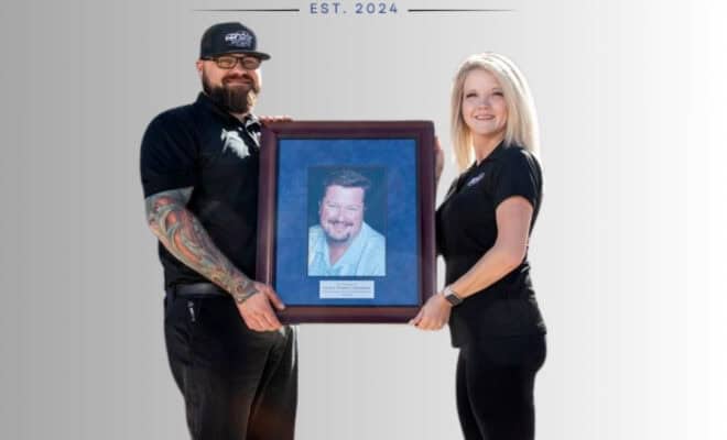 owners of Legacy Auto Clinic Castle Rock pose with Mr. Pridemore