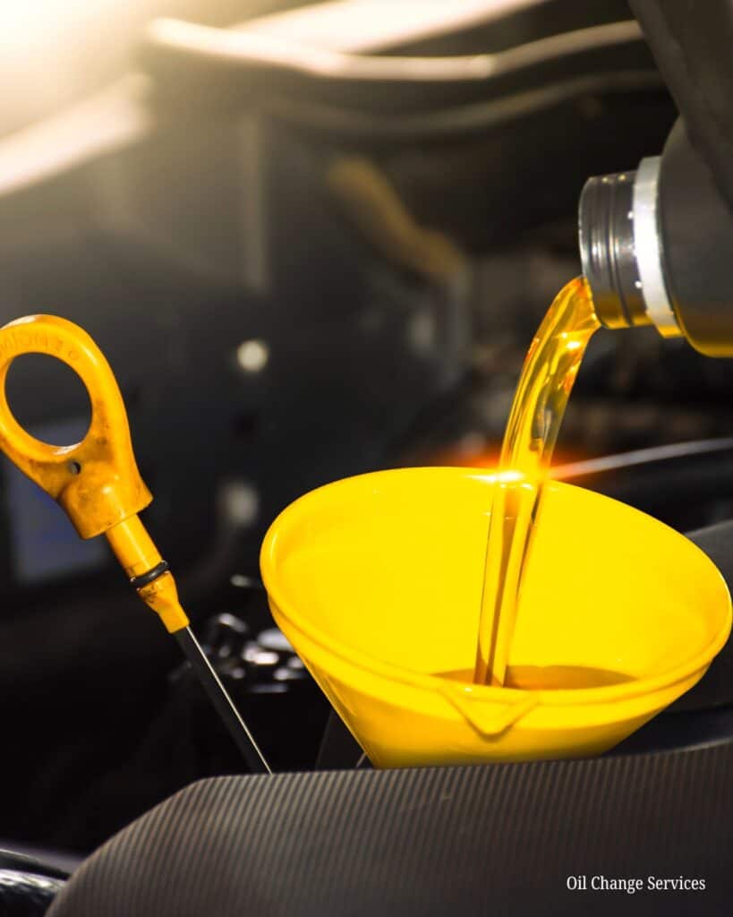 vehicle getting oil added via funnel Legacy Auto Clinic Castle Rock 